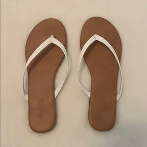 white flip flops